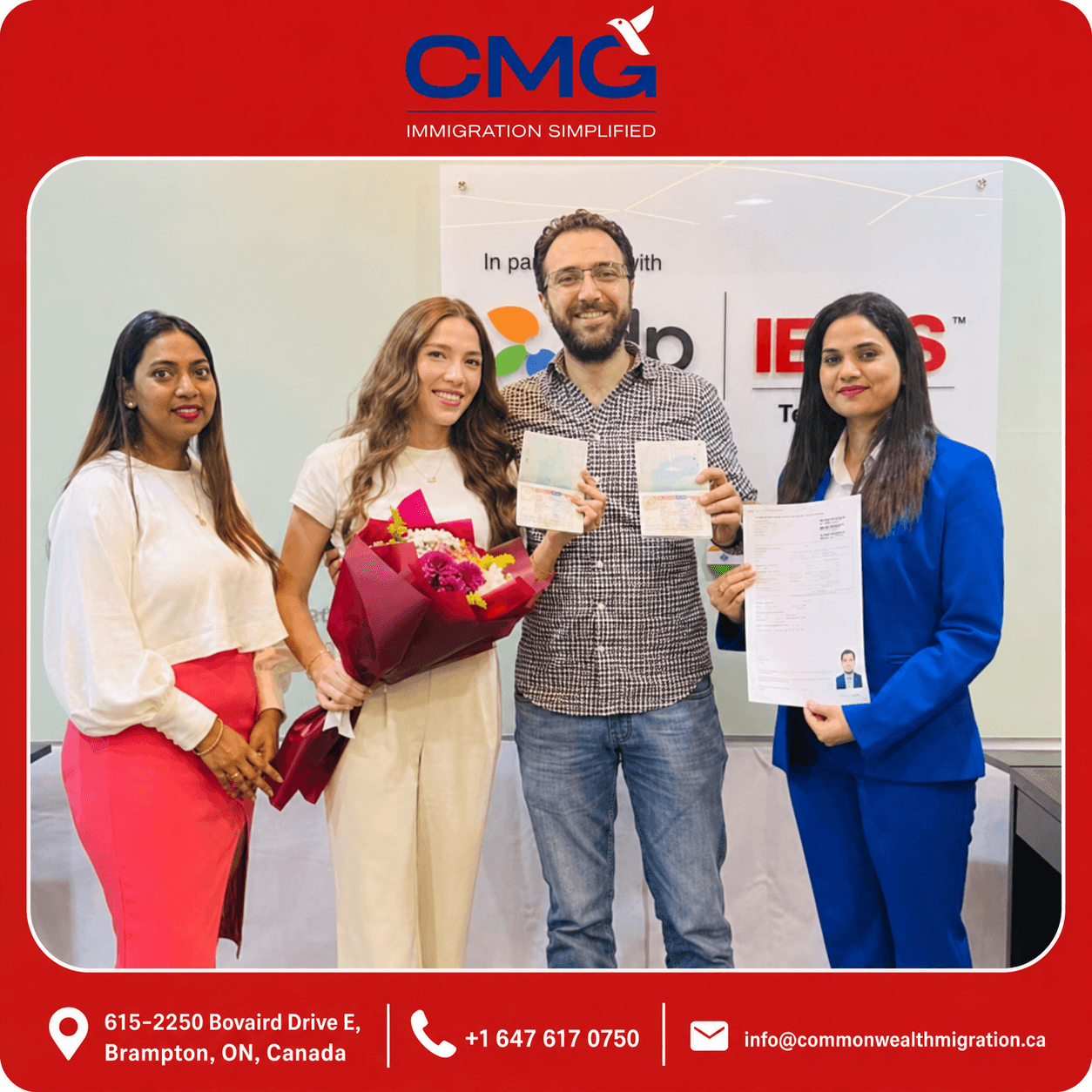 CMG client holding travel documents after an immigration milestone